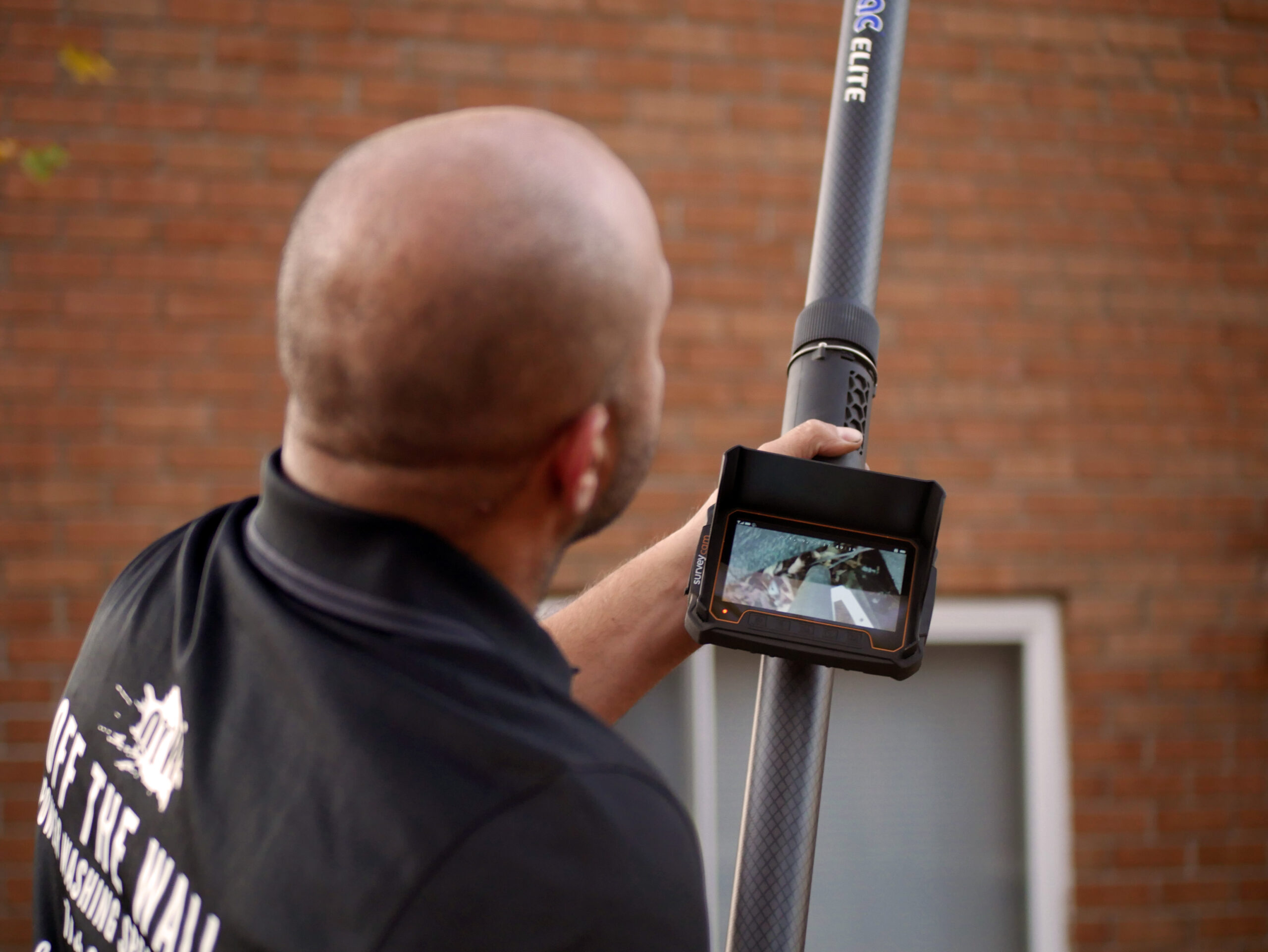 photo of the HD display mounted on the gutter cleaning machine